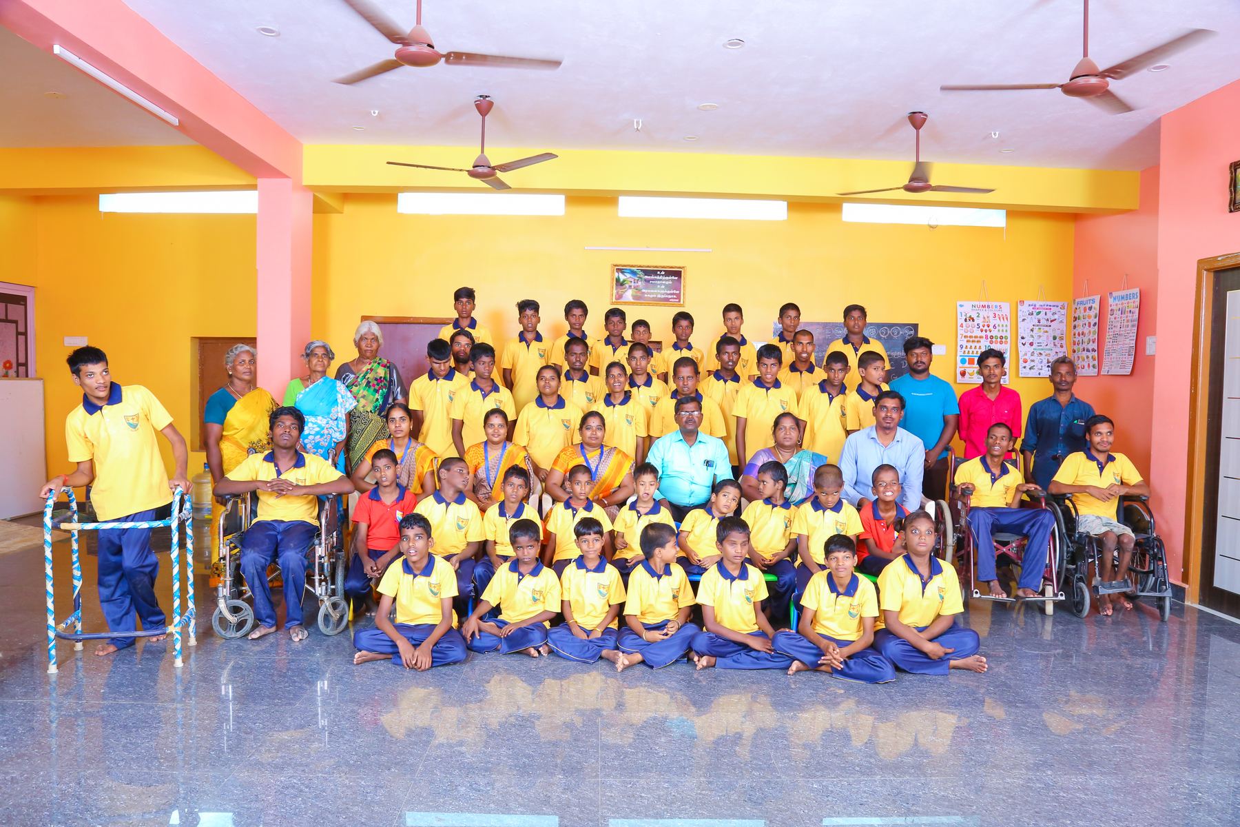 Students and staff of Synthika Special School gathered for a group photo